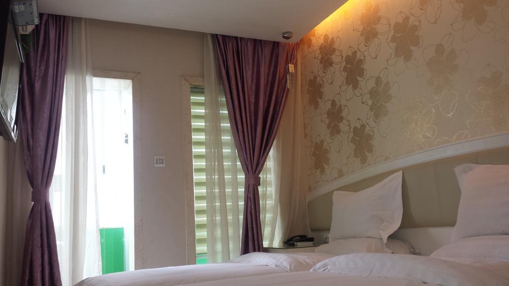Xinghe Xinfeng Hotel Kuangcsou Kültér fotó