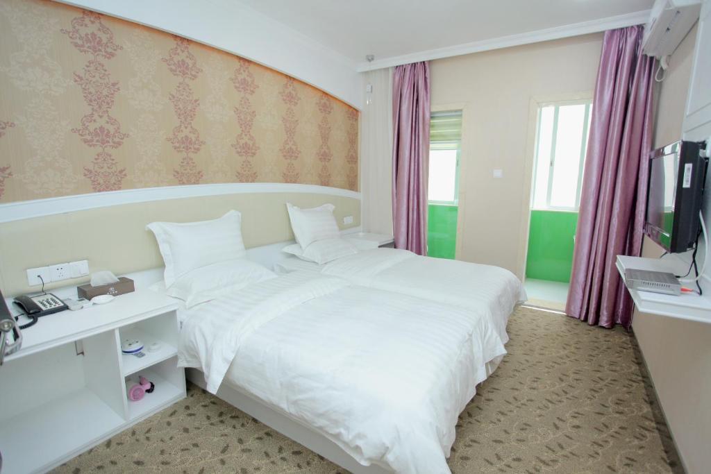 Xinghe Xinfeng Hotel Kuangcsou Szoba fotó