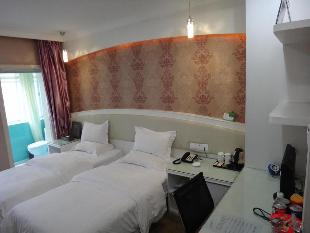 Xinghe Xinfeng Hotel Kuangcsou Kültér fotó