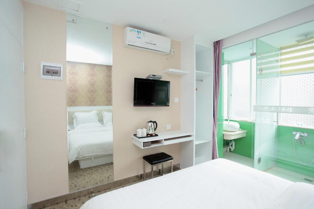 Xinghe Xinfeng Hotel Kuangcsou Szoba fotó