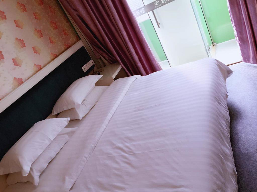 Xinghe Xinfeng Hotel Kuangcsou Kültér fotó