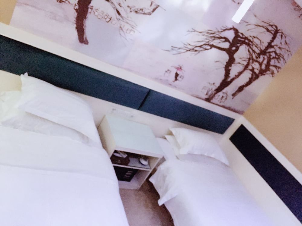 Xinghe Xinfeng Hotel Kuangcsou Kültér fotó