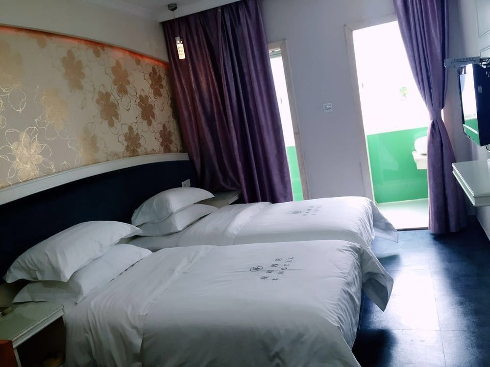 Xinghe Xinfeng Hotel Kuangcsou Kültér fotó
