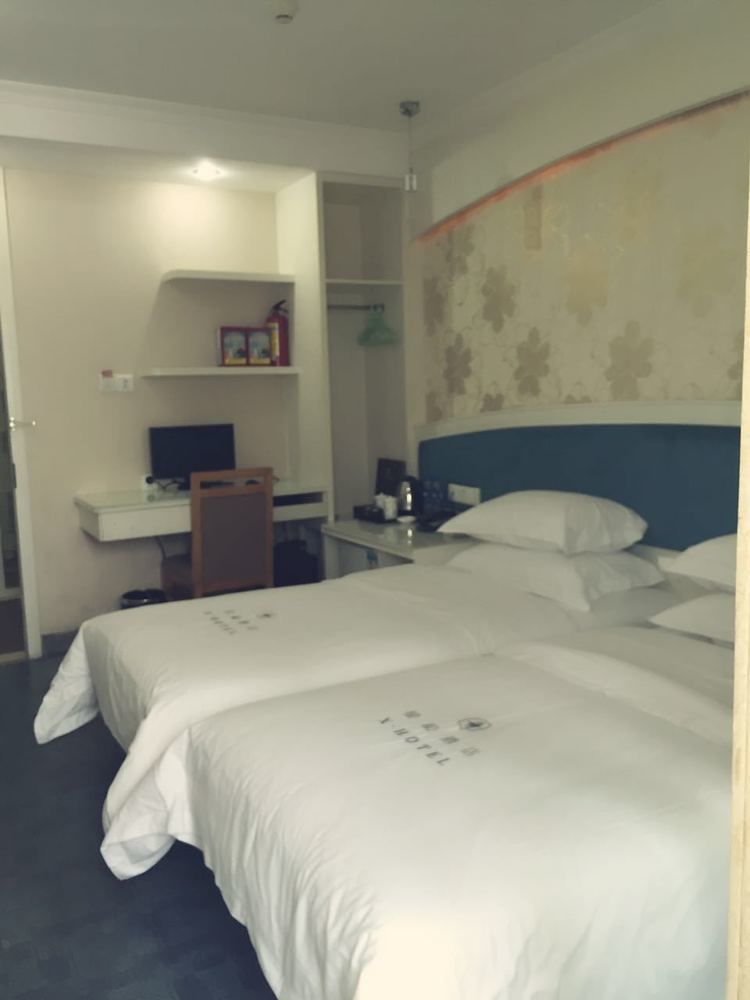 Xinghe Xinfeng Hotel Kuangcsou Kültér fotó