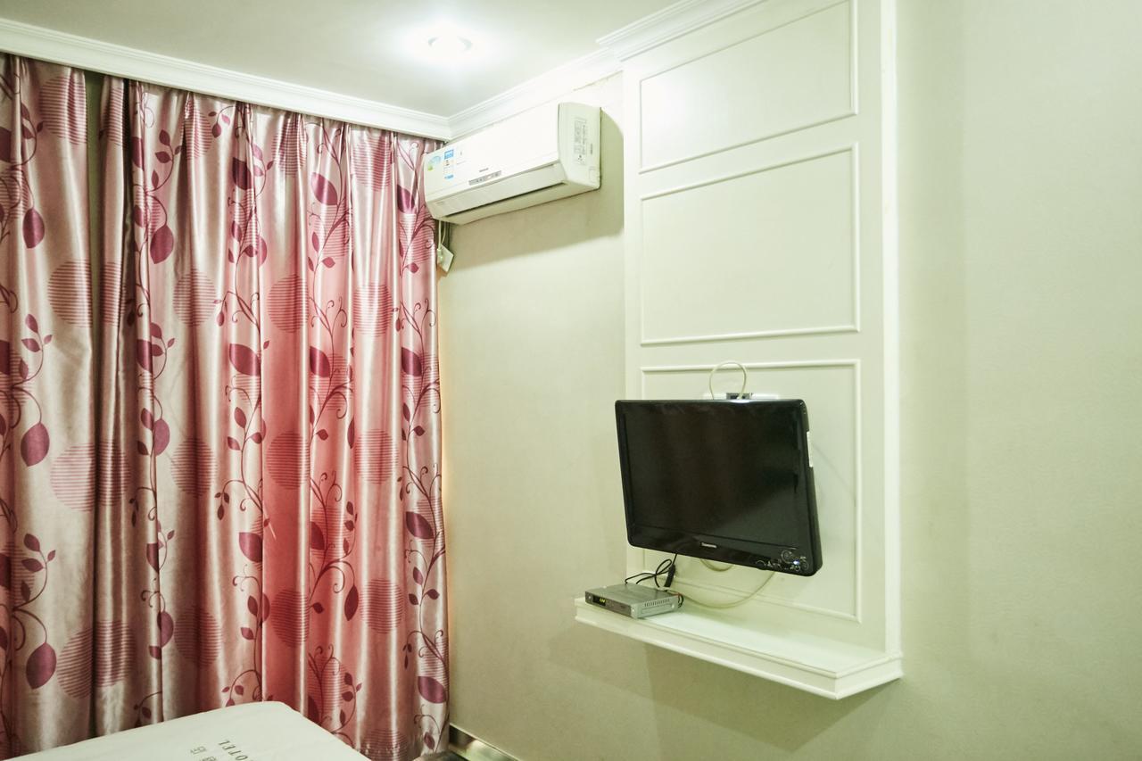 Xinghe Xinfeng Hotel Kuangcsou Kültér fotó