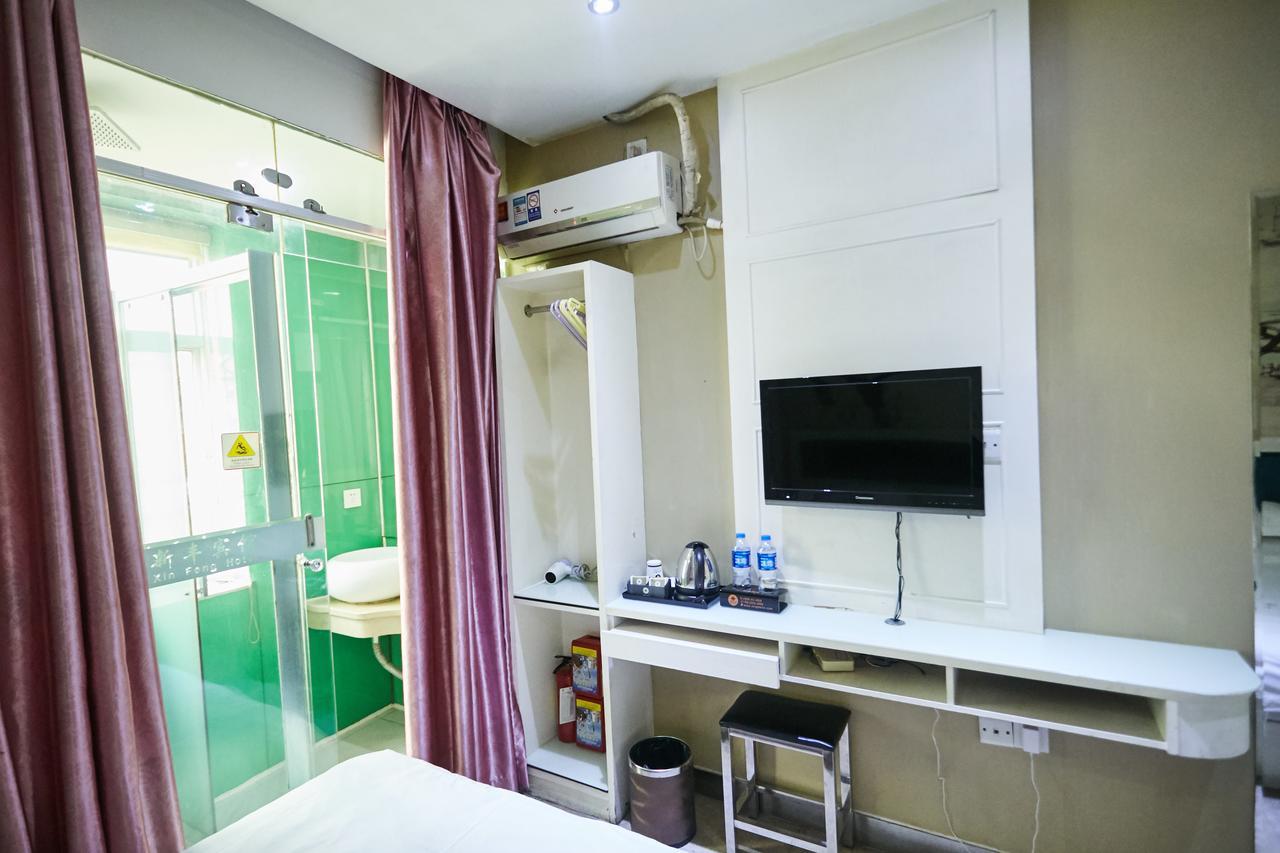 Xinghe Xinfeng Hotel Kuangcsou Kültér fotó